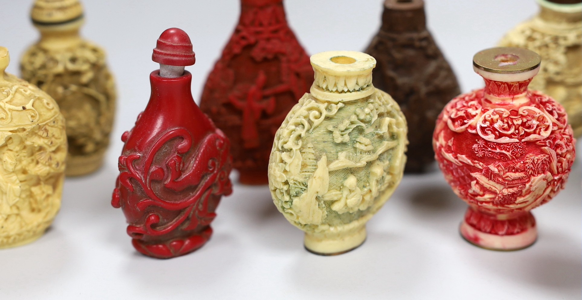 A collection of moulded resin snuff bottles